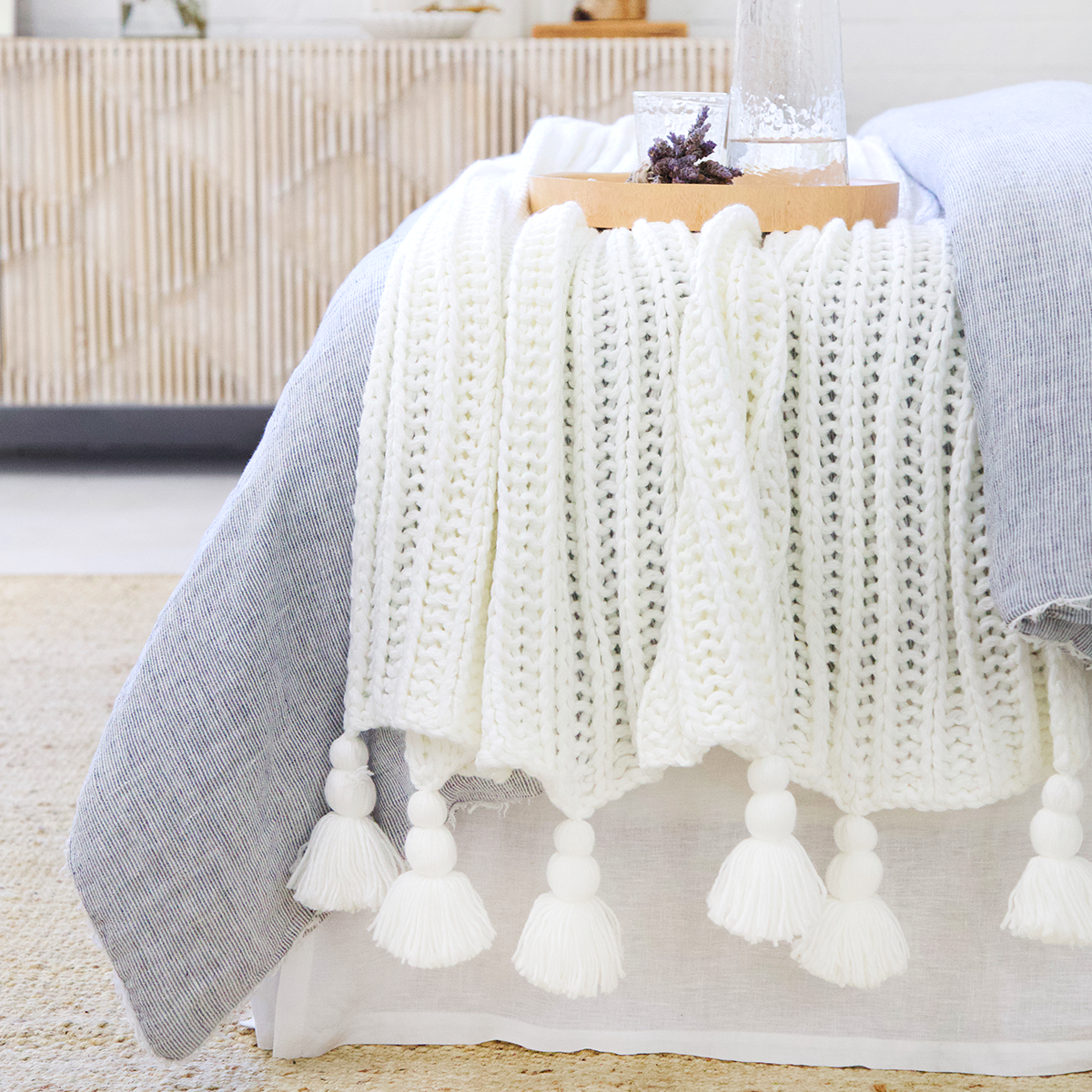 Cozy Up Your Home: Adding Pom Poms and Tassels to Blankets and